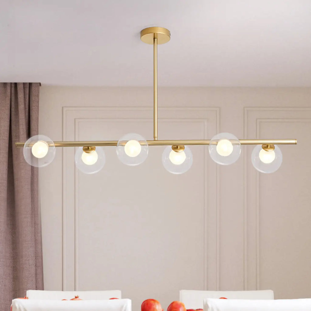 Gold Linear Island Light with 6 Lights Transparent Glass Globe Shades
