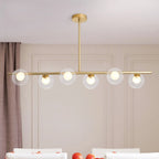 Gold Linear Island Light with 6 Lights Transparent Glass Globe Shades