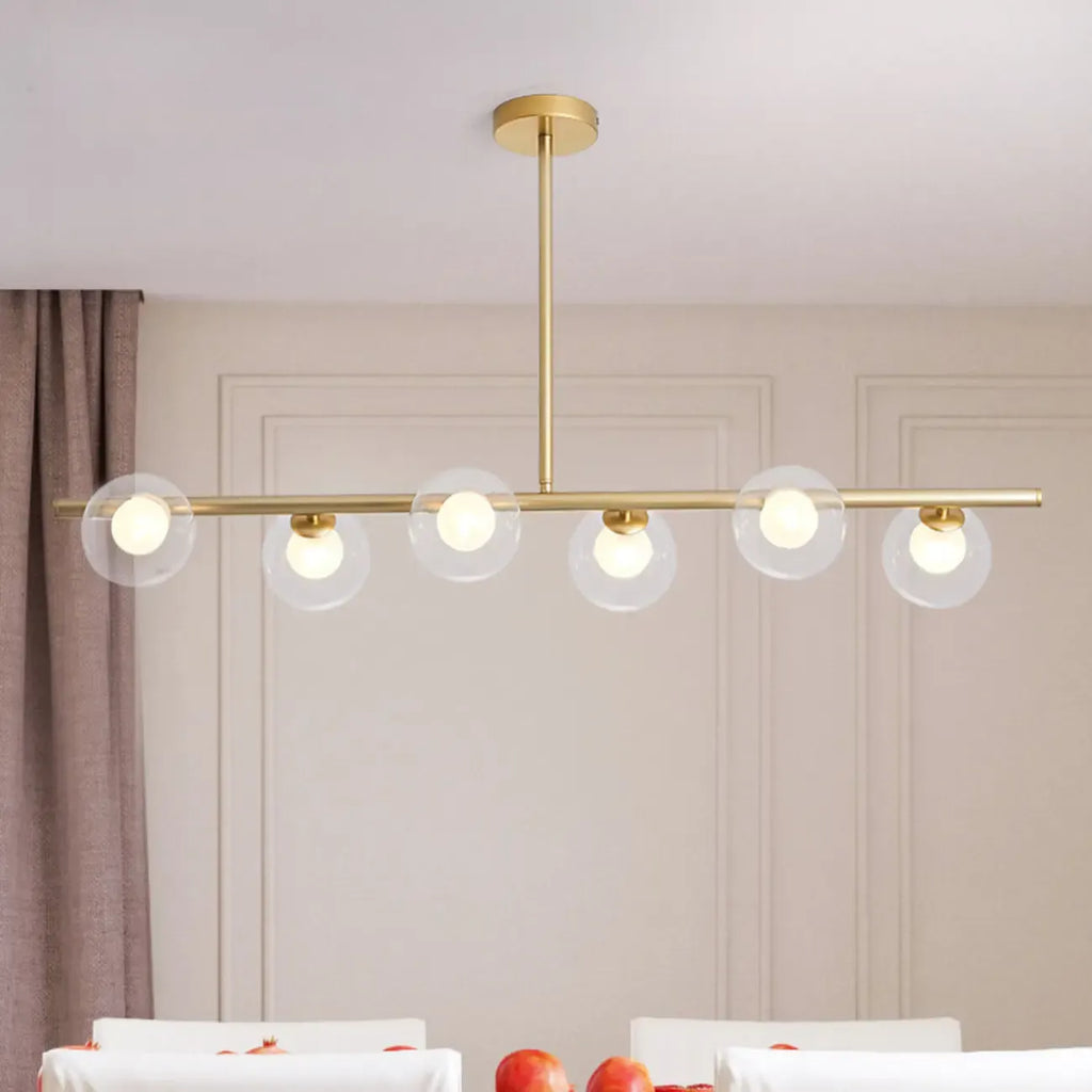 Gold Linear Island Light with 6 Lights Transparent Glass Globe Shades