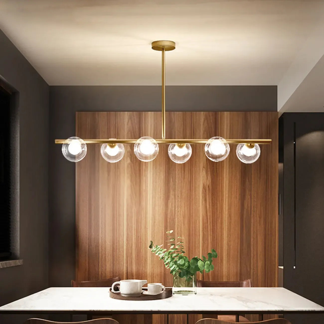 Gold Linear Island Light with 6 Lights Transparent Glass Globe Shades